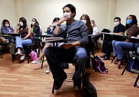 College Students Attend A Class In Labor Law Wearing Masks To Protect Against The Swine Flu Contagion, At Mexico City's University Of London May 2009