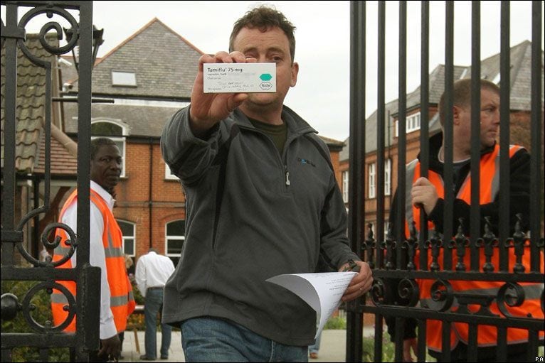 Parent Collecting Tamiflu Parent Collecting Tamiflu At A School In Southeast London, A School Closed Due To H1N1