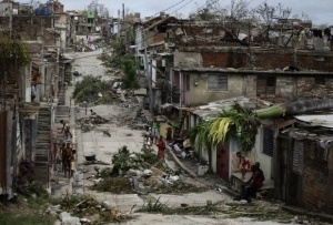 Hurricane Sandy Hit Cuba Hard. The Storm Ripped Through Santiago, In The Southern End Of The Island, Damaging An Estimated 230,000 Homes And Leaving 11 Cubans Dead.