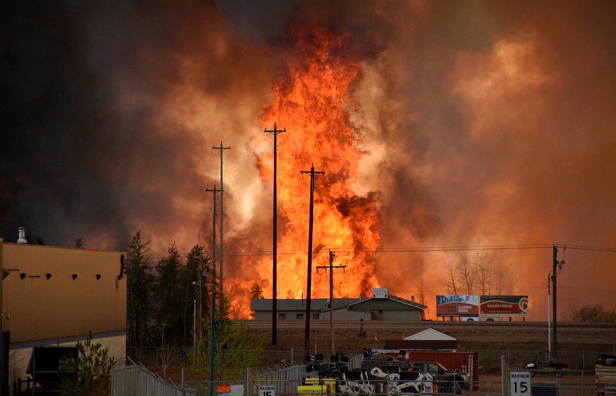 Flames Rise In Industrial Area South Fort Mcmurray, Alberta Canada May 3, 2016. Terry Reith/Cbc News/Handout Via Reuters Attention Editors - This Image Was Provided By A Third Party. Editorial Use Only. No Resales. No Archive. Mandatory Credit. One Time Use Only. - Rtx2Cvk1